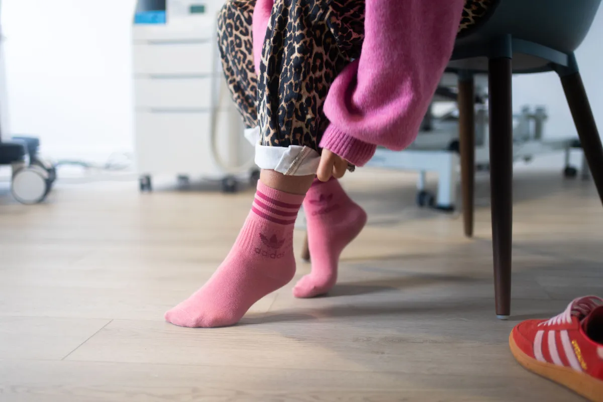 Young patient attending a podiatry appointment for a foot assessment at Lower Limb Clinic Belfast